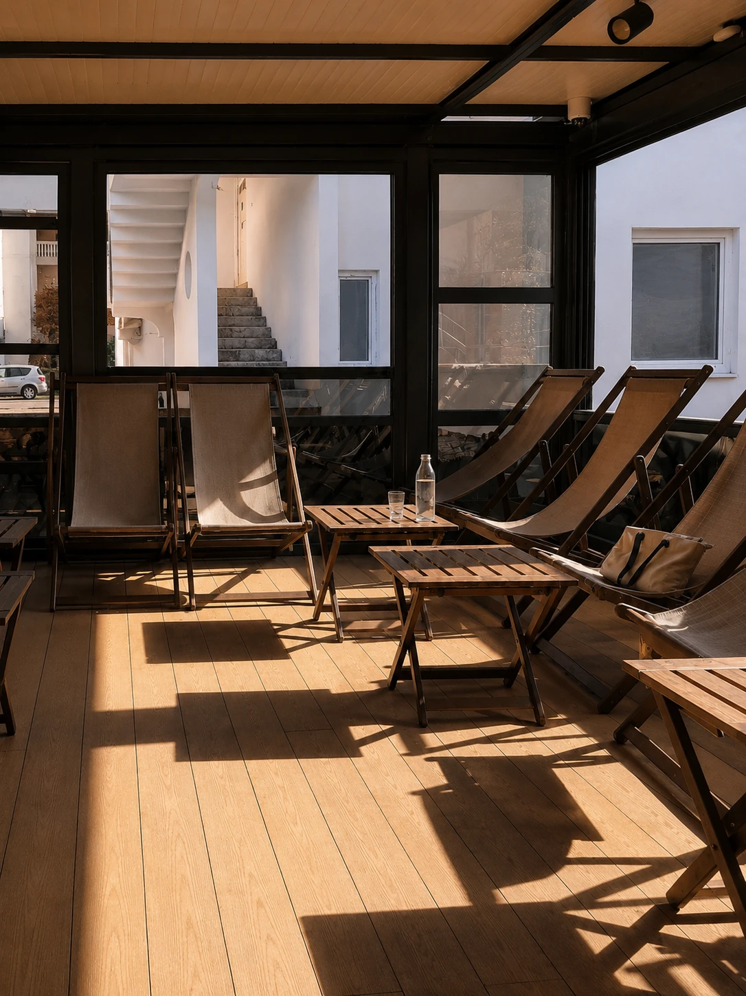 Second-floor enclosed terrace lounge